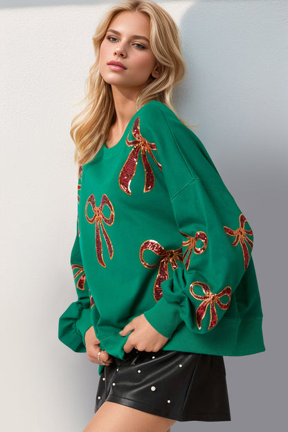 Double Take Christmas Bow Sequin Round Neck Dropped Shoulder Sweatshirt - Folded Express